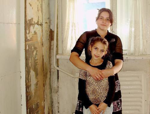 Residents of a barrack for displaced persons from North Ossetia. Ingushetia, refugees' camp in the village of Ali-Yurt, September 24, 2011. Photo by Malika Batsaeva for the "Caucasian Knot"