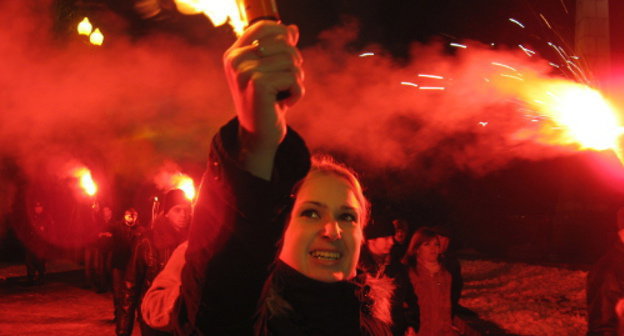 Participant of torch march of nationalists on the anniversary of Manege Square riots in Moscow after the murder of the football fan Yegor Sviridov, Volgograd, December 11, 2011. Photo by Vyacheslav Yaschenko for the "Caucasian Knot"