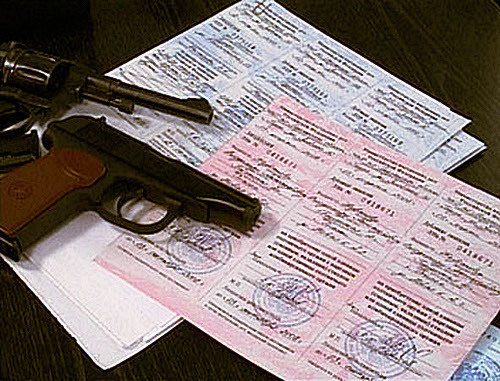 Weapon licenses and guns. Photo from http://07.mvd.ru