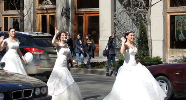 Participants of the action "Happy Georgia"  marche along the Rustaveli Avenue. Tbilisi, Georgia, March 14, 2013. Photo by Edita Badasyan for the "Caucasian Knot"