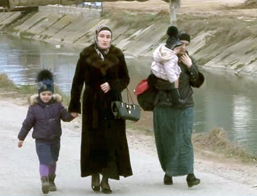 Women and children leave the CTO zone, Makhachkala, township of Semender, March 20, 2013. Still from the video posted on the website of the MIA of Dagestan,  http://05.mvd.ru