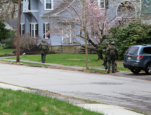 New Hampshire State troopers canvas a neighborhood in Watertown, Mass., April 19, 2013. Photo: Sally Vargas, Talk Radio News Service, http://www.flickr.com/photos/talkradionews/8664228538 