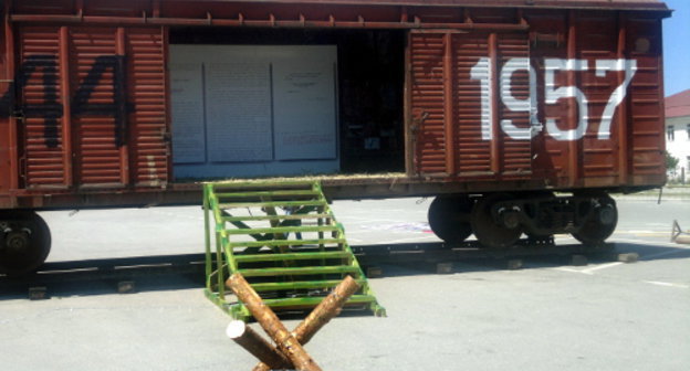 Cattle wagon with dates of deportation and return of Chechens to homeland installed in the Memorial Complex "Alley of Glory", Grozny, April 10, 2013. Photo of the "Caucasian Knot"