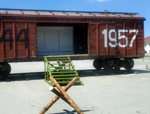 Cattle wagon with dates of deportation and return of Chechens to homeland installed in the Memorial Complex "Alley of Glory", Grozny, April 10, 2013. Photo of the "Caucasian Knot"