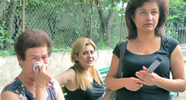 Goar Mnatsakanyan,  mother of David Barsegyan (to the right), after her son had been found guilty, Nagorno-Karabakh, Stepanakert. July 23, 2013. Photo by Alvard Grigoryan for the “Caucasian Knot”. 