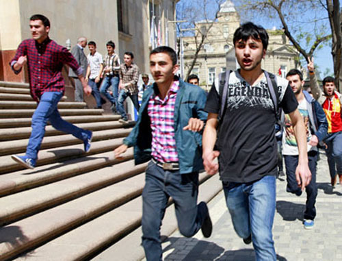 Participants of the rally in memory of victims of mass murder in Oil Academy which was dismissed by the police. Baku, April 30, 2013. Photo by Aziz Karimov.