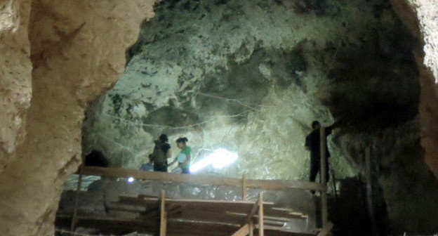 Archaeologists are working at a height of 40 m, in the cultural layer of the Azokh Cave. Hadrut District of Nagorno-Karabakh, village of Azokh, August 4, 2013. Photo by Alvard Grigoryan for the "Caucasian Knot"