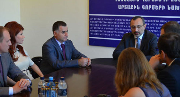 Karen Mirzoyan, Foreign Minister of Nagorno-Karabakh (to the right on the background), receives a group of Russian journalists and public figures who came with visit to Stepanakert. August 28, 2013. Photo http://www.nkr.am/