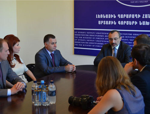 Karen Mirzoyan, Foreign Minister of Nagorno-Karabakh (to the right on the background), receives a group of Russian journalists and public figures who came with visit to Stepanakert. August 28, 2013. Photo http://www.nkr.am/