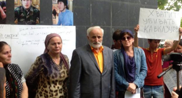 Participants of the rally demand fair investigation of the murder of natives of Northern Caucasus. Grozny, August 21, 2013. Photo by Kheda Saratova