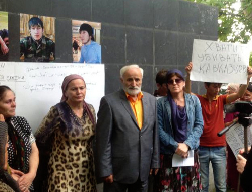 Participants of the rally demand fair investigation of the murder of natives of Northern Caucasus. Grozny, August 21, 2013. Photo by Kheda Saratova