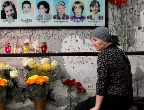 In the gymnasium of the school No. 1 near the desk with the photos of persons killed in the terror act in September 2004. September 1, 2012. Photo by Emma Marzoyeva for the "Caucasian Knot"