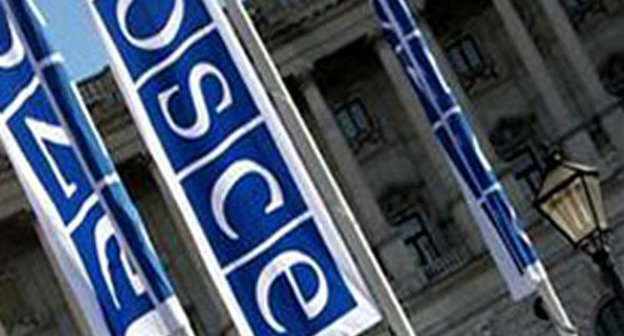 Flag of OSCE. Photo http://www.1news.az/