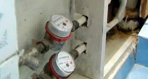 House calculating device in a basement of a dwelling house in Cherkessk. Snapshot of a footage by http://stolica-kchr.ru/