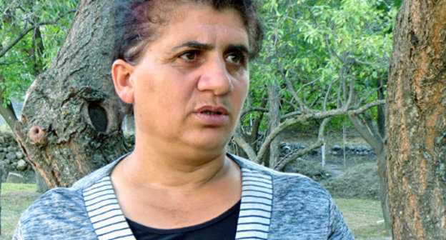 Narine Mirzoyan complains about being forced to live in the damaged house in Tsitsernavank. Kashatag District of Nagorno-Karabakh, September 13, 2013. Photo by Alvard Grigoryan for the "Caucasian Knot"