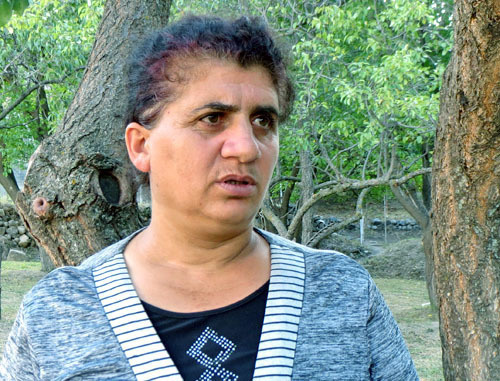 Narine Mirzoyan complains about being forced to live in the damaged house in Tsitsernavank. Kashatag District of Nagorno-Karabakh, September 13, 2013. Photo by Alvard Grigoryan for the "Caucasian Knot"