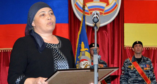 Zalina Berezova, mother of the perished Police Lieutenant Zaur Djibilov, receives a posthumous award for the son. North Ossetia, Vladikavkaz, November 8, 2013. Photo by Dmitry Tamerlanov for the "Caucasian Knot"