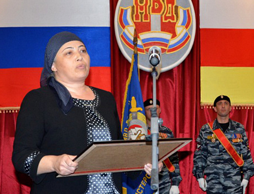 Zalina Berezova, mother of the perished Police Lieutenant Zaur Djibilov, receives a posthumous award for the son. North Ossetia, Vladikavkaz, November 8, 2013. Photo by Dmitry Tamerlanov for the "Caucasian Knot"