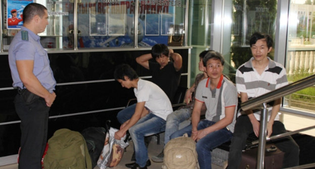 Grozny airport, Chechnya. Deportation of Vietnamese nationals. July 2013. Photo of Migration Service Department of Chechnya, http://www.r20.fssprus.ru/