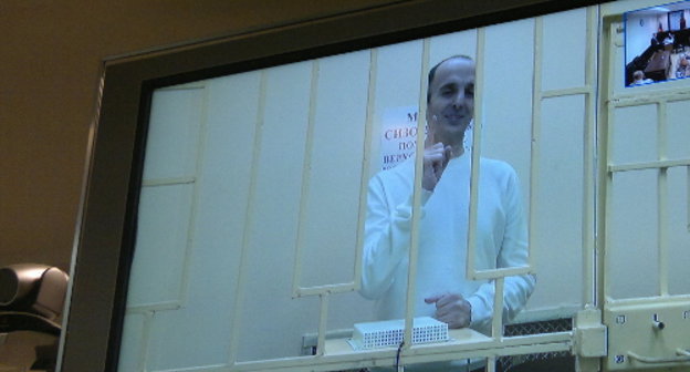 Yusup Temerkhanov, sentenced in a high security colony, takes part in the court session in the case of murdering Yuri Budanov via video conference. Moscow, Russia's Supreme Court, December 4, 2013. Photo by the "Caucasian Knot"