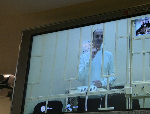 Yusup Temerkhanov, sentenced in a high security colony, takes part in the court session in the case of murdering Yuri Budanov via video conference. Moscow, Russia's Supreme Court, December 4, 2013. Photo by the "Caucasian Knot"