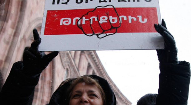 Participant of a rally demanding that Turkey should recognize the Armenian Genocide. Yerevan, December 12, 2013. Photo PanARMENIAN Photo/Karo Sahakyan