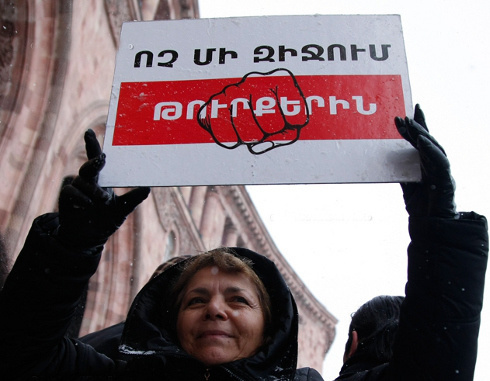 Participant of a rally demanding that Turkey should recognize the Armenian Genocide. Yerevan, December 12, 2013. Photo PanARMENIAN Photo/Karo Sahakyan