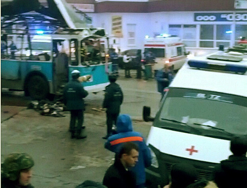 Volgograd, December 30, 2013. Blown-up trolley-bus at the tram stop "Kachinsky market". Still photo of a video footage by Alexei Ulianov at Instagram, http://instagram.com/p/iiIokbBbsP