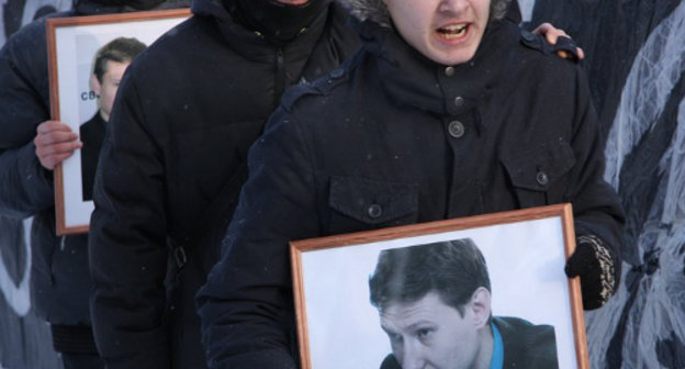 Participants of the march in memory of lawyer Stanislav Markelov and journalist Anastasia Baburova. Moscow, January 19, 2013. Photo: http://anatrrra.livejournal.com