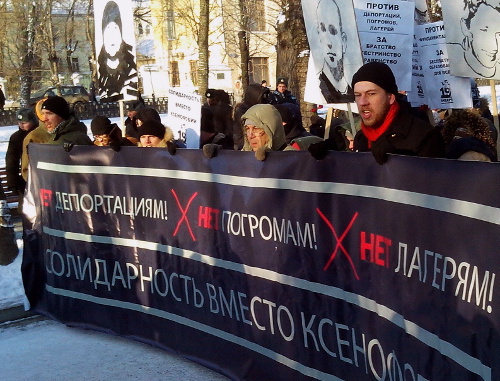 Participants of the procession in memory of Stanislav Markelov and Anastasia Baburov. Moscow, January 19, 2014. Photo by Natalia Krainova for the ‘Caucasian Knot’.  