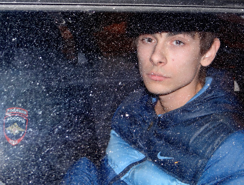 Activist of the "EcoWatch" Igor Kharchenko in police car, Krasnodar, February 4, 2014. Photo provided by "Ecological Watch for Northern Caucasus", http://ewnc.org/node/13505/