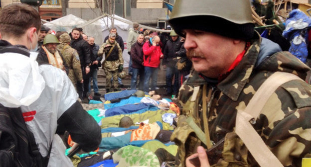 Maidan defenders paying tribute to their perished comrades. Kiev, February 21, 2014. Photo: Jeroen Akkermans, RTL News Berlin 