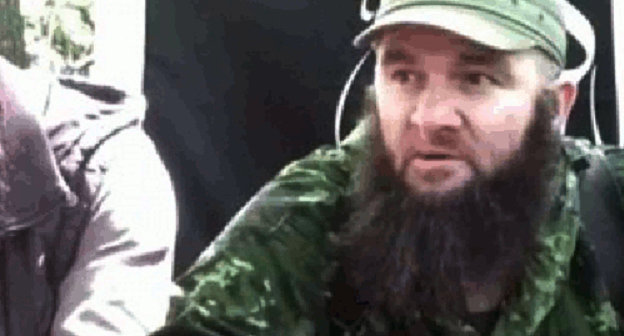 Dokku Umarov. Screenshot of a video message at Youtube