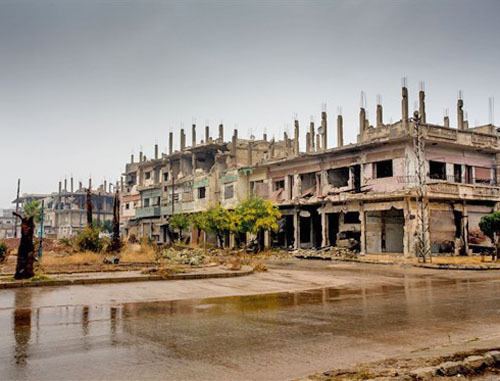 A photograph presented at the exhibition of photographers from Ufa called "Material evidence. Syria". March 7, 2014. Photo: Ministry of youth of Chechnya, http://www.chechenmol.ru/