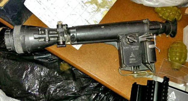 A large hiding with weapons and ammunition found in the house by the FSB officers. Dagestan, Buynaksk, March 11, 2014. Photo by http://nac.gov.ru/