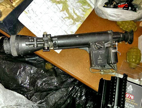 A large hiding with weapons and ammunition found in the house by the FSB officers. Dagestan, Buynaksk, March 11, 2014. Photo by http://nac.gov.ru/