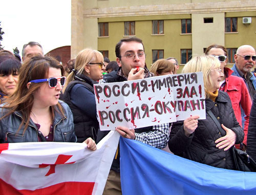 Protest action against TV Bridge with Russia. Tbilisi, March 28, 2014. Photo by Edita Badasyan for the "Caucasian Knot"