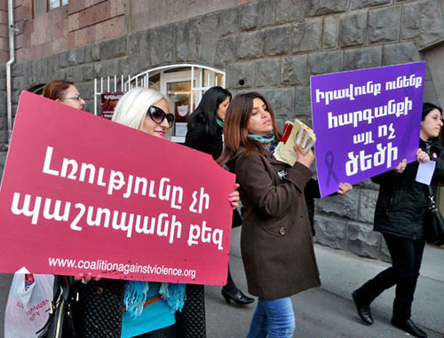 Participants of a protest action against violence against women. Inscription on a poster: "Women, know your rights!". Yerevan, November 25, 2013. Photo by Armine Martirosyan for the "Caucasian Knot"