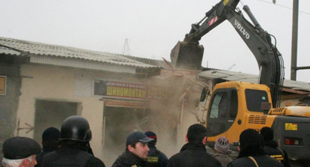 Demolition of  illegally constructed building by court marshals. Dagestan, 2012. Photo from the archive of Dagestan UFSSP press-service, http://r05.fssprus.ru 