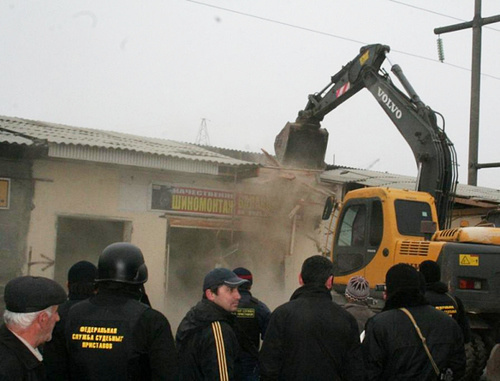 Demolition of  illegally constructed building by court marshals. Dagestan, 2012. Photo from the archive of Dagestan UFSSP press-service, http://r05.fssprus.ru 