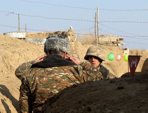 Militants of the Nagorno-Karabakh Defense Army report to the commander on the situation on front line. Nagorno-Karabakh, Martuninsky District, December 30, 2013. Photo by Alvard Grigoryan for the "Caucasian Knot"