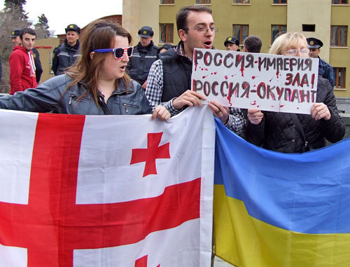 Participants of a protest action against TV Bridge with Russia. Tbilisi, March 28, 2014. Photo by Edita Badasyan for the "Caucasian Knot"