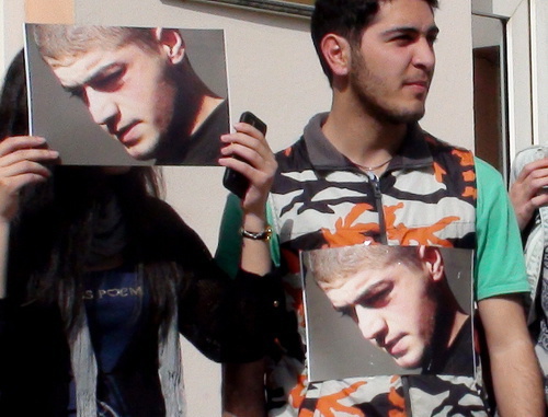 Activists with a portrait of Mamed Azizov at the silent protest action near the building of the Court of Appeal. Baku, March 27, 2014. Photo by Parvana Bayramova for the "Caucasian Knot"