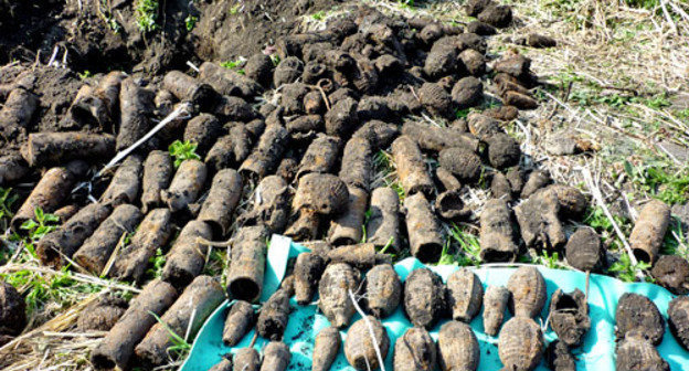 A hideout with grenades and shells of the Russian Civil War found by the local ethnographic expedition "Native Landscape", headed by Victor Kotlyarov and Maria Kotlyarova. Kabardino-Balkaria, April 22, 2014. Photo by Lyudmila Maratova