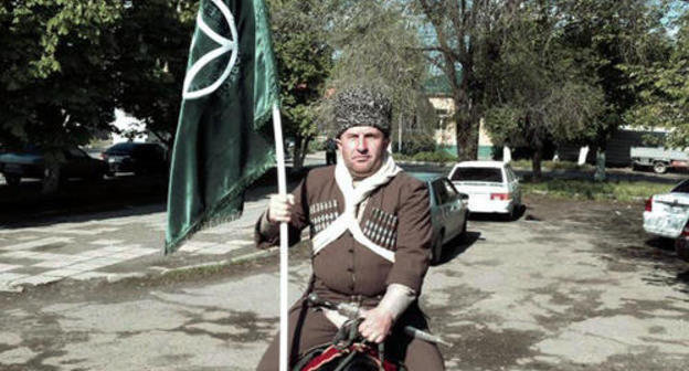 Participant of the horse march dedicated to the 57th anniversary of the return of deported Karachay people to their historic homeland. Karachay-Cherkessia, the Kuban Region, village Znamenka, May 3, 2014. Photo by Kemal Urusov and Artur Baychorov for the "Caucasian Knot: