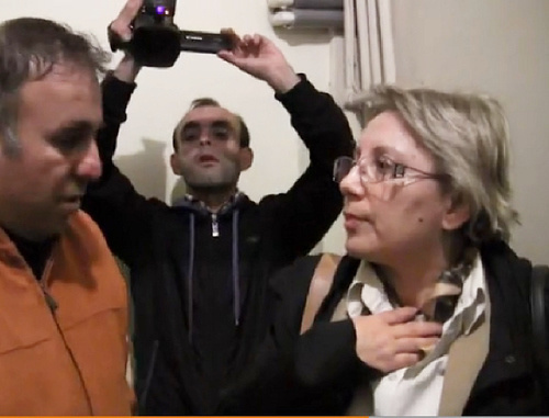 Human rights activist Leyla Yunus, director of the Institute for Peace and Democracy, being detained. Baku, April 28, 2014. Screenshot from video taken by Radio Azadlyg, Copyright 2014 RFE/RL. 