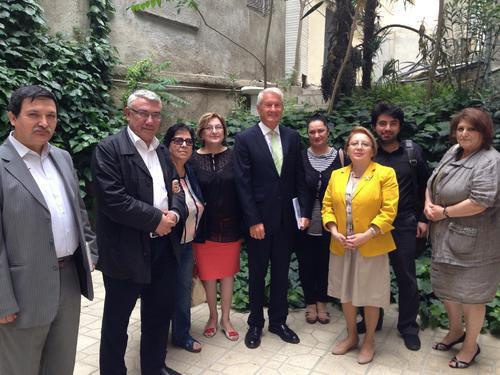 To the right: civil society activists Eldar Zeinalov, Eldar Namazov, Novella Dzhafaroglu, Saida Godzhamanly, Arzu Abdullaeva, Leyla Yunus, Emil Guseinov, Sadaat Bananyarly and Thorbjorn Jagland, the Secretary General of the Council of Europe (CoE) (in the centre) in the yard of the Baku office of the CoE. May 20, 2014. Photo by IRFS