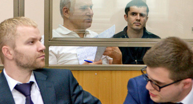 Said Amirov (to the right) and Yusup Djaparov in the courtroom. The defence is in front. Rostov-on-Don, May 13, 2014. Photo by Oleg Pchelov for the "Caucasian Knot" 