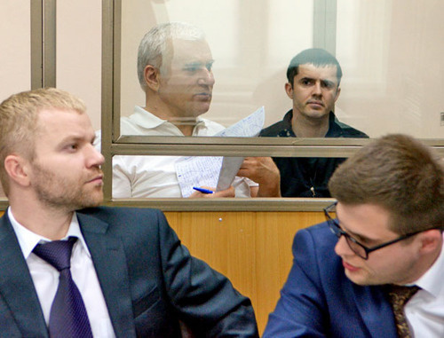 Said Amirov (to the right) and Yusup Djaparov in the courtroom. The defence is in front. Rostov-on-Don, May 13, 2014. Photo by Oleg Pchelov for the "Caucasian Knot" 