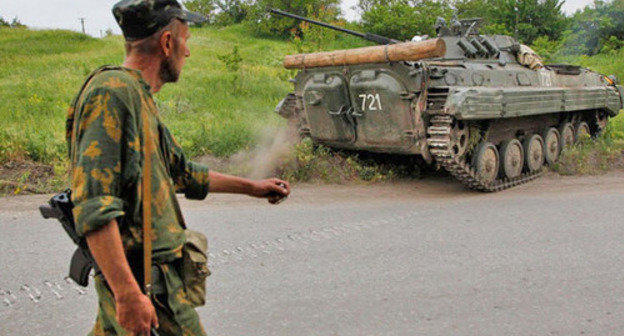 Armed man. Donbass. Photo: Russkaya Vesna (Russian Spring), http://rusvesna.su